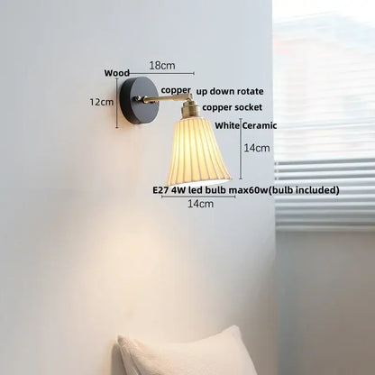 Industrial black wood led wall sconce with copper arm white pleated ceramic shade and decorbites black wood base