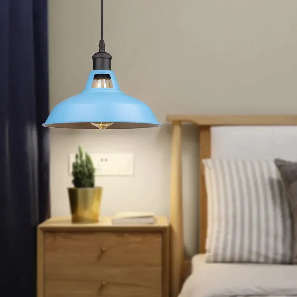 Light blue industrial-style pendant light with black fixture and exposed bulb for decorbites blue vintage kitchen decor