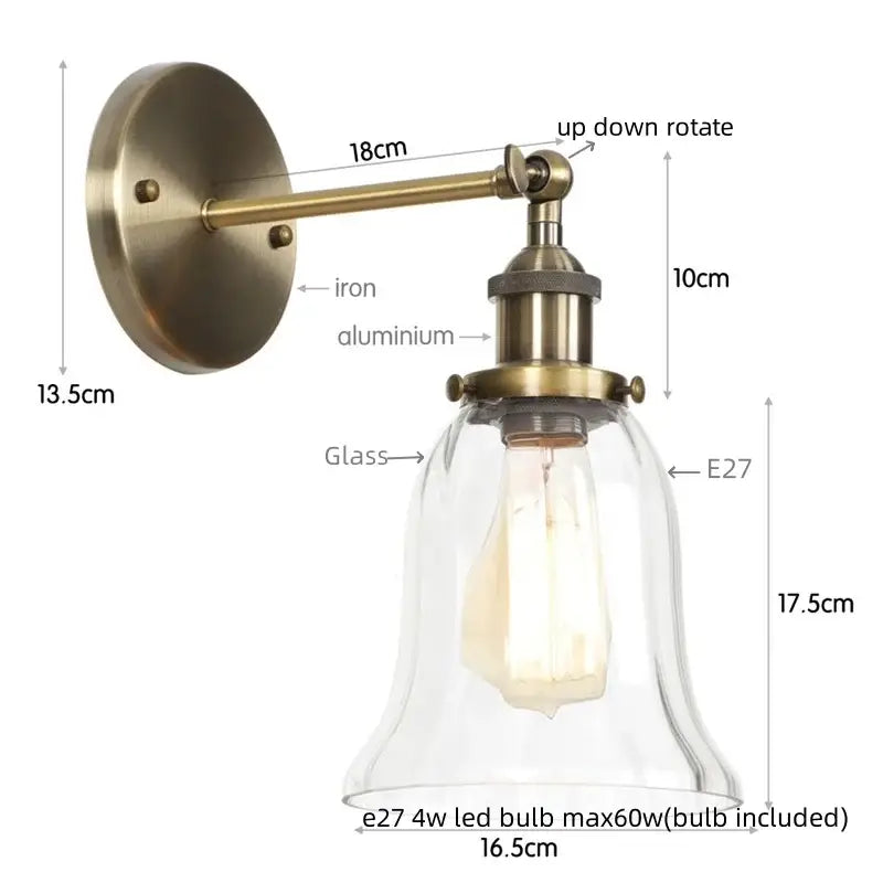 Antique brass wall sconce with clear glass bell-shaped shade and exposed Edison bulb decorbites industrial clear design