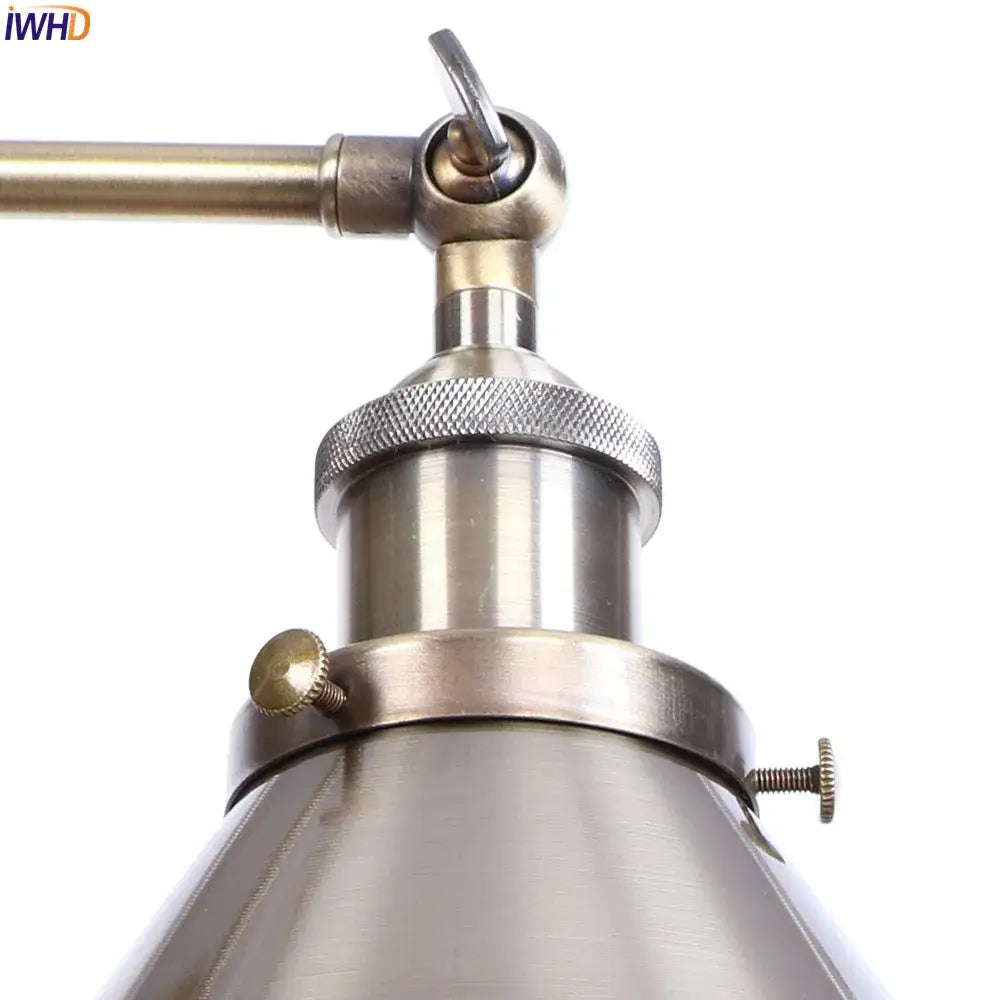 Industrial brass edison wall light with adjustable sconce and brushed metallic finish featuring brass accents for decorbites decor