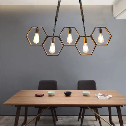 Industrial brass hexagonal pendant light with metal frames and exposed edison bulbs for bar and restaurant decorbites industrial style