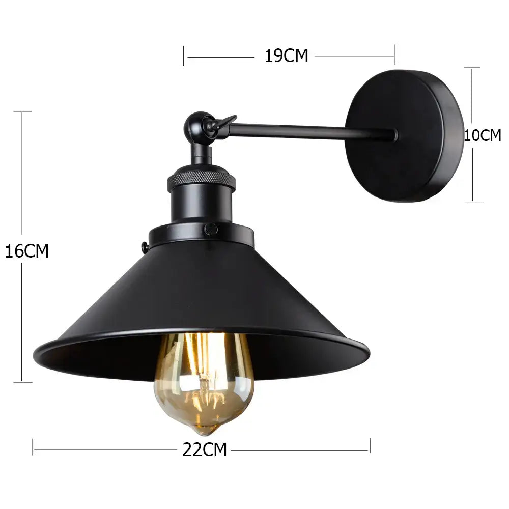 Black industrial-style led wall lamp with matte finish adjustable arm and conical shade featuring warm filament bulb