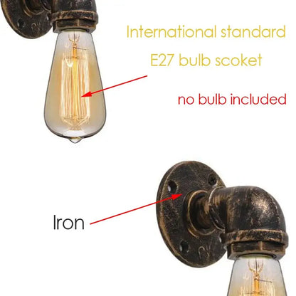 Industrial brass pipe wall sconce with dark aged iron pipe design and exposed filament bulb by decorbites industrial iron