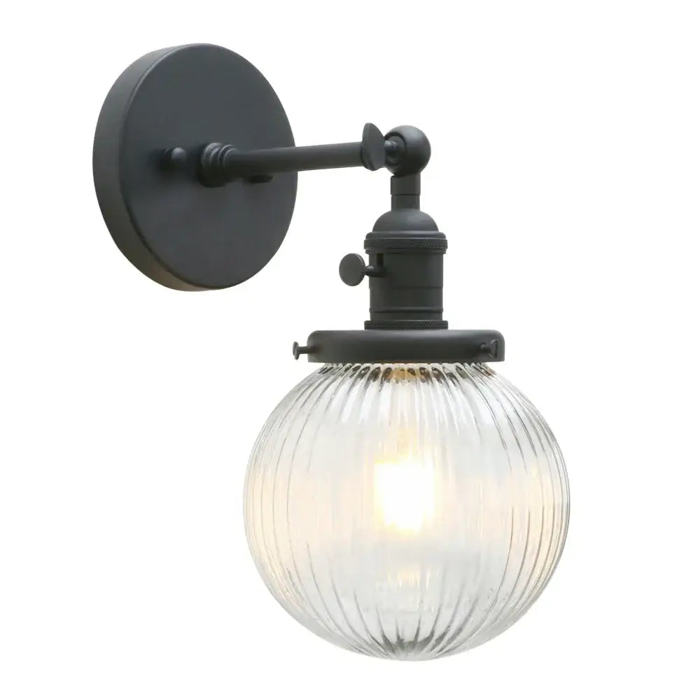 Black wrought iron wall sconce with clear industrial ribbed glass globe for decorbites industrial ribbed kitchen light