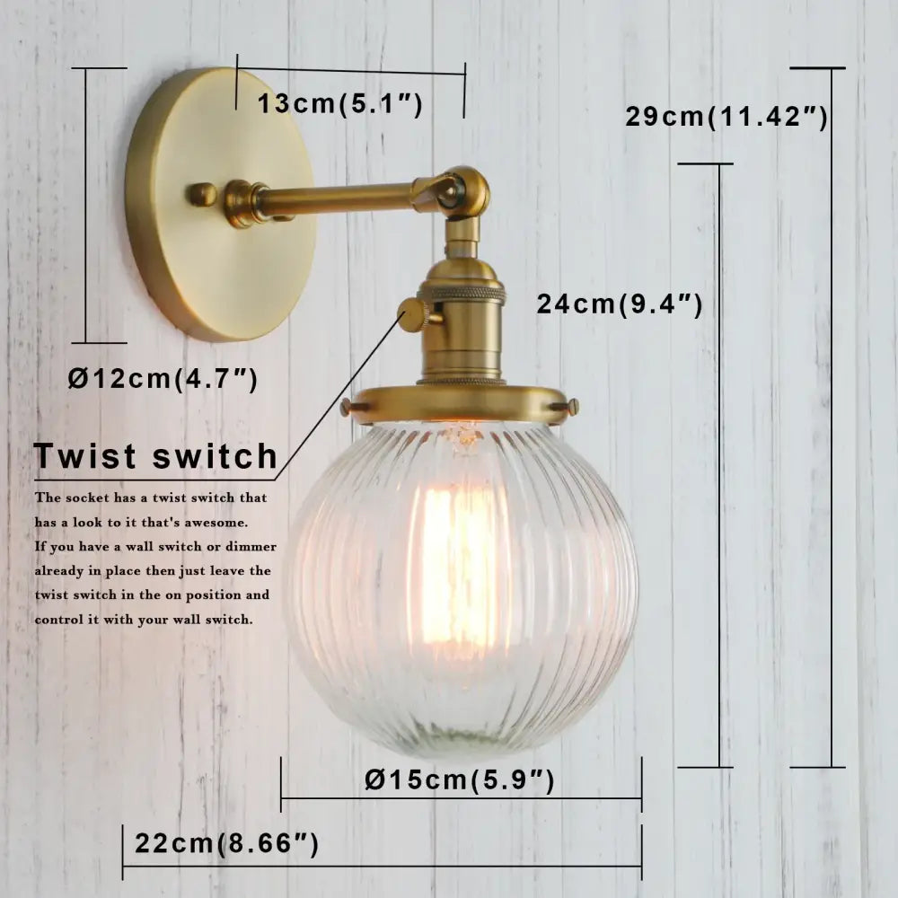 Brass-finished wall sconces with industrial ribbed glass globe and exposed filament bulb for kitchen light decorbites industrial ribbed