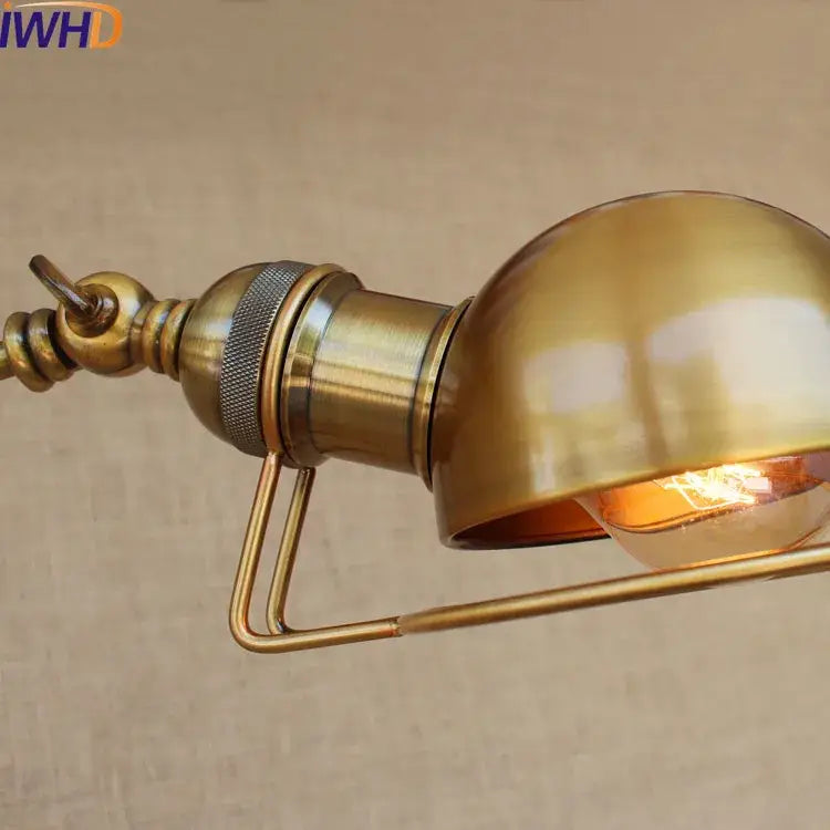 Antique brass industrial-style led wall lamp with swing arm and rounded dome shade for bedroom reading light