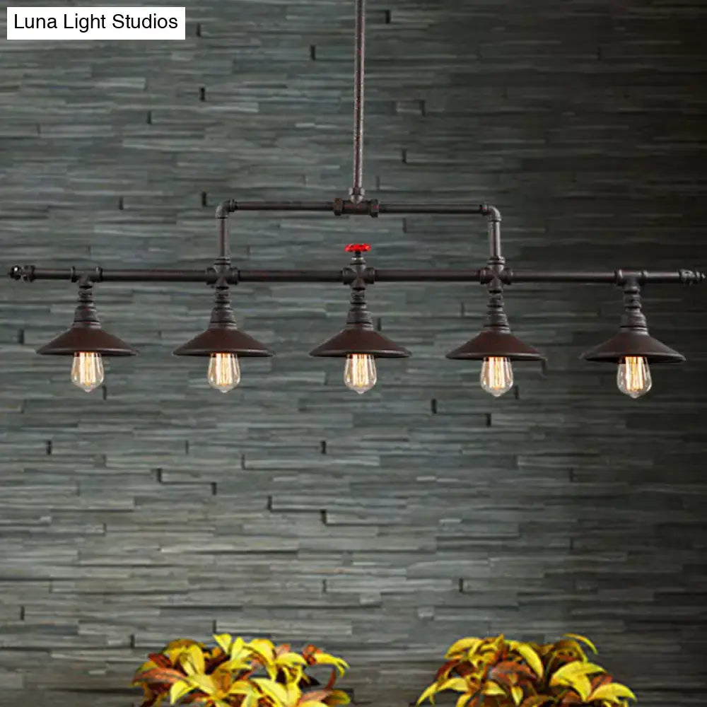 Industrial bronze pipe island light with five exposed filament bulbs and red valve accent for dining room pendant