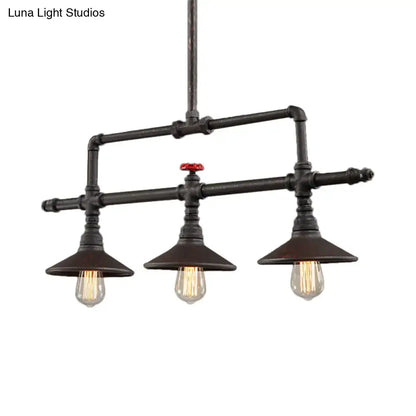 Industrial bronze pipe island light dining room pendant with black pipes three exposed filament bulbs and red valve accent