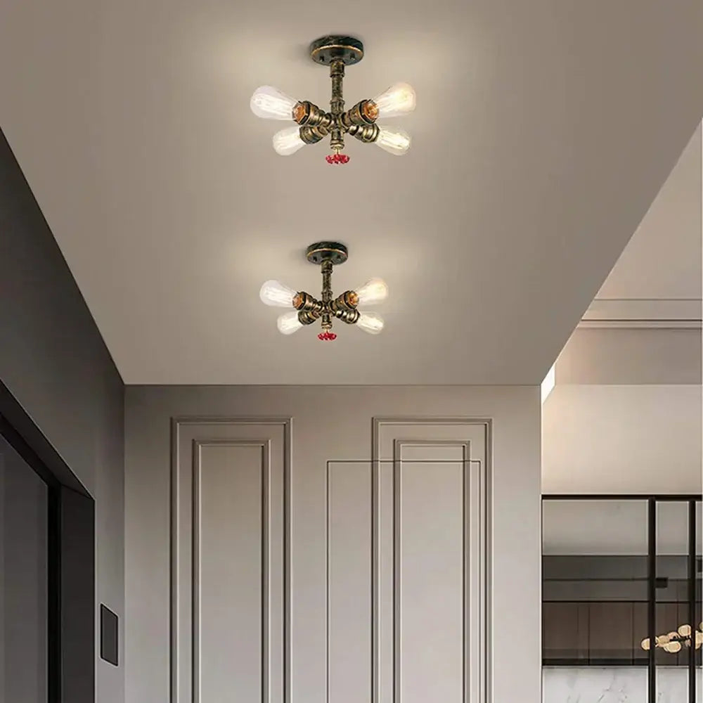 Vintage-style industrial bronze ceiling light fixture with four exposed bulbs and red crystal accents for living room