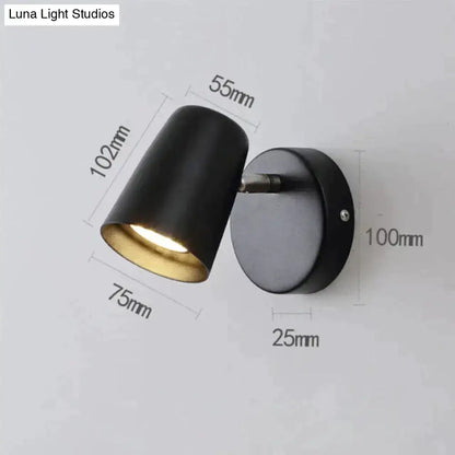 Black matte industrial led wall sconce with gold interior lining and brushed nickel finish for bedroom spotlight use