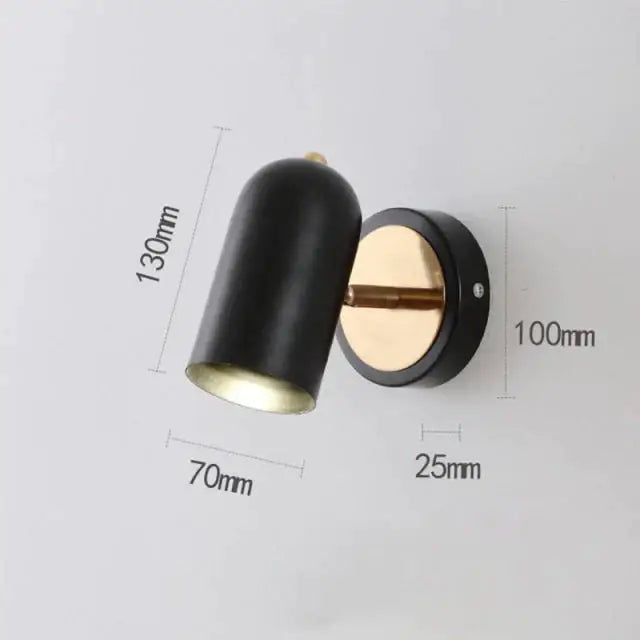 Industrial led wall sconce black cylindrical spotlight with gold base and adjustable arm for bedroom lighting