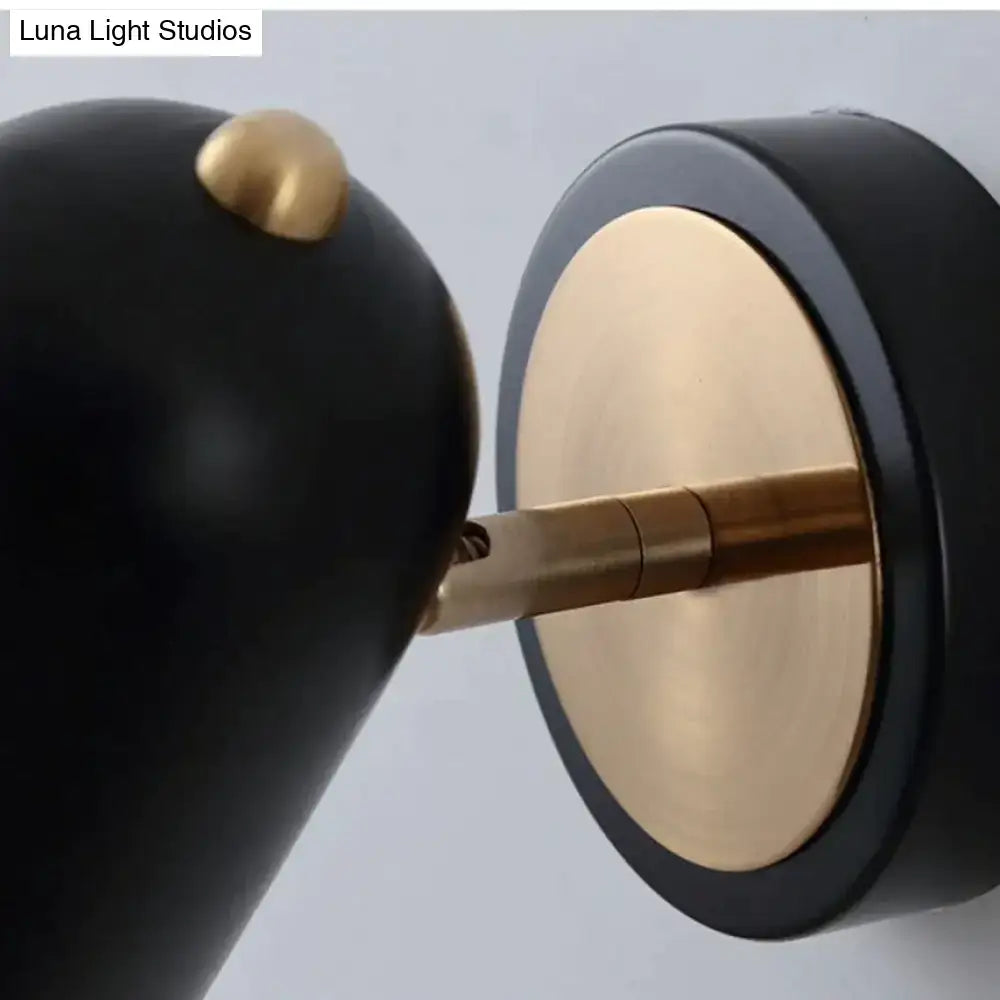 Black and brass industrial led wall sconce with brushed nickel finish and minimalist design for bedroom spotlight use