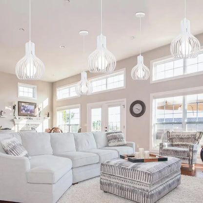White wireframe industrial cage led pendant light with modern geometric design for black and white living room decorbites decor