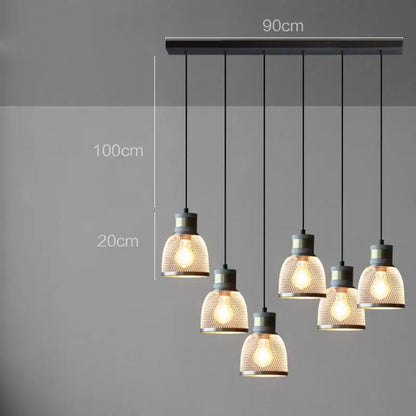 Industrial cement metal pendant light with five warm-toned mesh shades for dining room decorbites industrial cement style