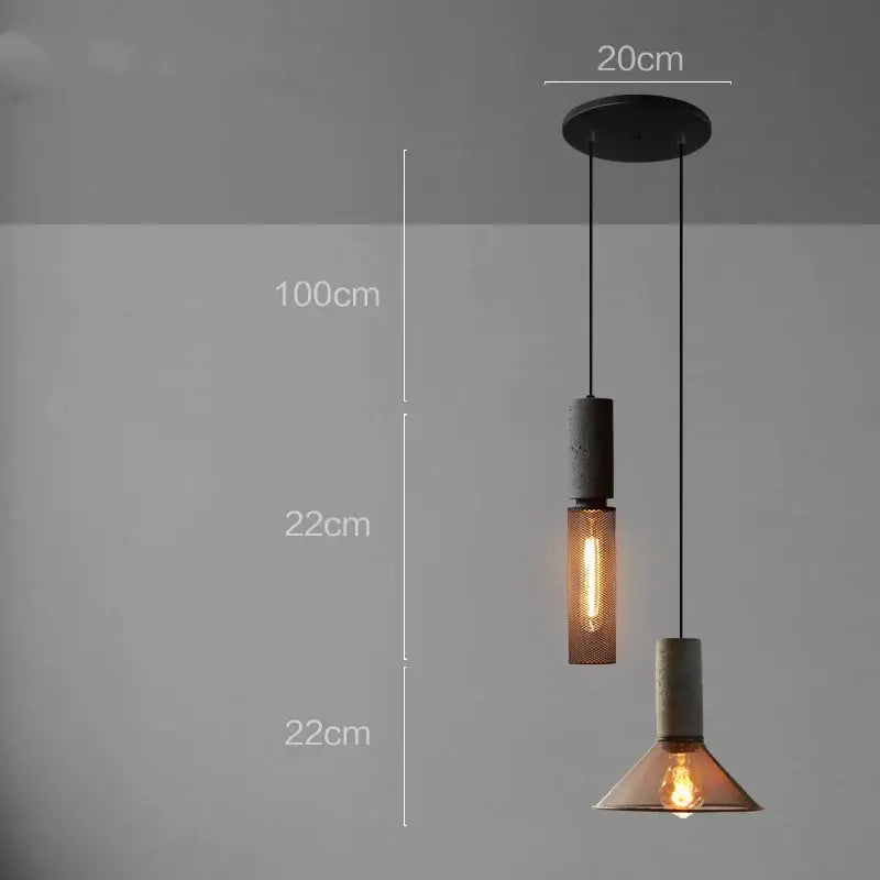 Industrial cement metal pendant light with matte black mount and textured concrete and amber glass shades for dining room decorbites industrial cement