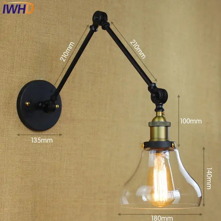 Industrial chrome glass swing arm wall lamp with black and brass adjustable sconce and clear glass bell shade filament bulb