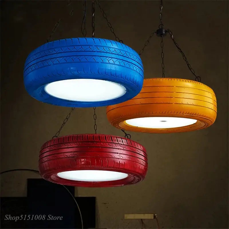 Decorbites industrial rubber pendant light featuring vibrant blue orange and red recycled tire treads for kitchen decor