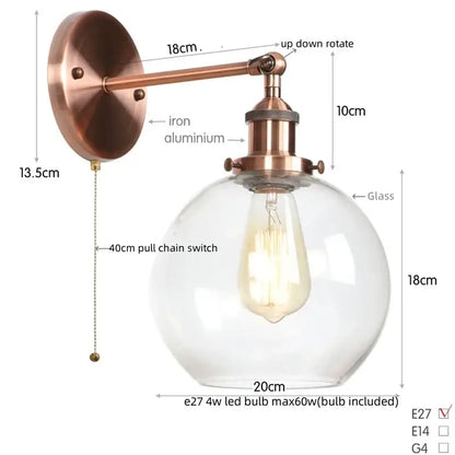 Industrial copper wall sconce featuring a decorbites glass globe led with an exposed edison bulb for bedroom lighting