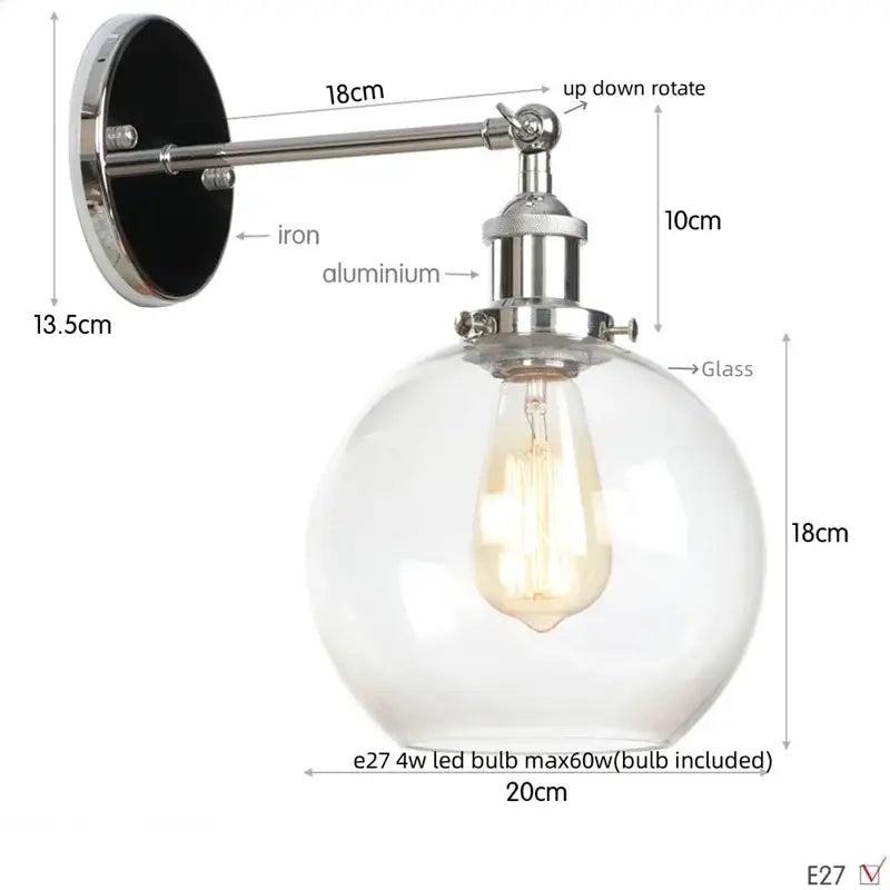 A sleek industrial wall sconce with polished chrome decorbites glass globe and exposed edison glass globe led bulb