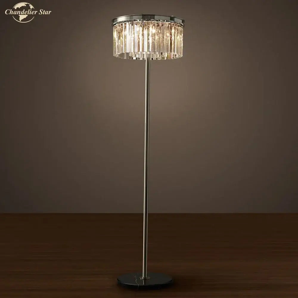 A sleek industrial crystal led floor lamp with a tall black chrome pole and circular chandelier shade for living room decorbites