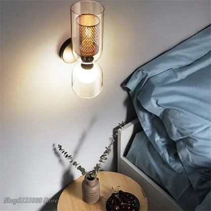 Modern glass wall lamp featuring a double head iron net frame with honeycomb mesh shade and frosted glass diffuser