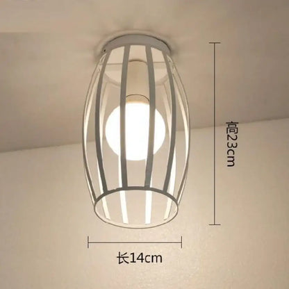 A modern cylindrical industrial e27 ceiling lamp with vertical metal bars and frosted glass for living room decorbites industrial e27