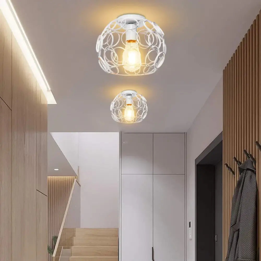 Industrial e27 ceiling lamp featuring a white spherical wireframe design with a warm bulb for modern decorbites industrial e27 lighting