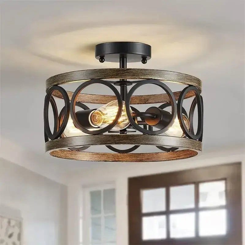 Industrial farmhouse circular chandelier with rustic wood grain frame black metal accents and exposed edison bulbs for dining room decorbites industrial farmhouse