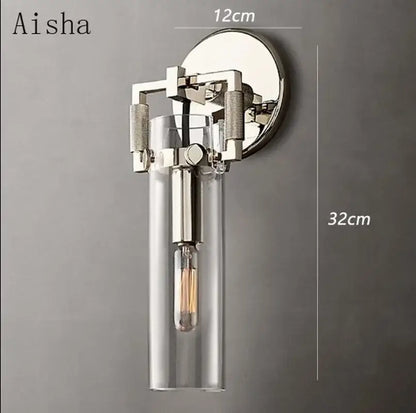 Aisha brand wall lamp with chrome metal frame and clear glass shade featuring exposed filament bulb for decorbites industrial glass wall decor