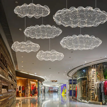 White wireframe decorbites cloud pendant lights made of wire mesh hang from the ceiling for industrial bedroom decor