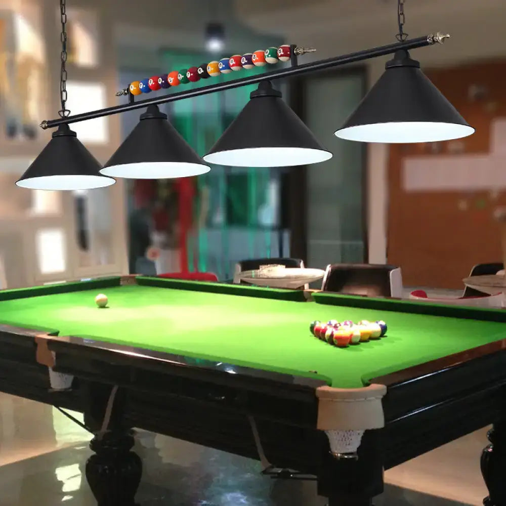 Black three-light metal billiard lamp with decorative bar holding colorful balls for country club island use