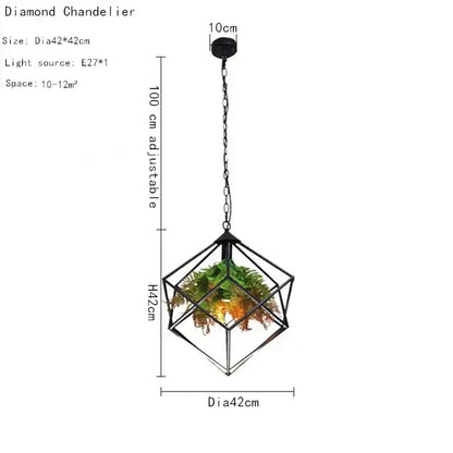 Black metal industrial greenery chandelier with diamond frame housing green plants and illuminated interior by decorbites industrial