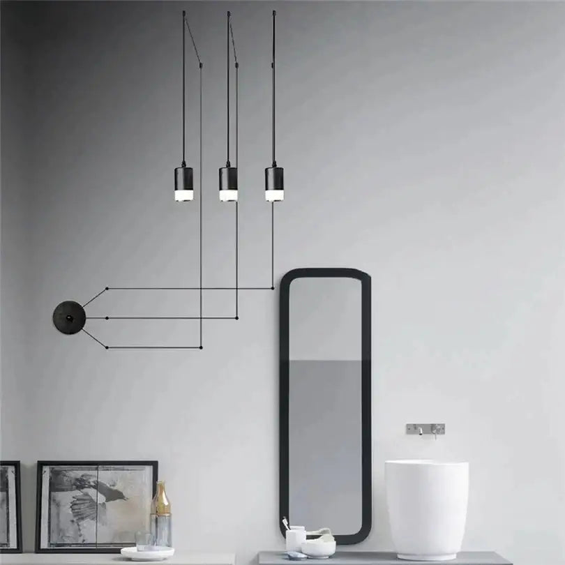 Modern black industrial iron art pendant light with cylindrical shades for minimalist bathroom decorbites industrial iron