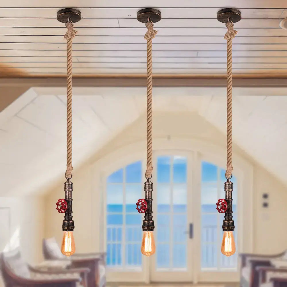 Industrial iron pipe pendant light with rustic rope suspension and vintage brass pipe fixtures for dining room decorbites iron pipe