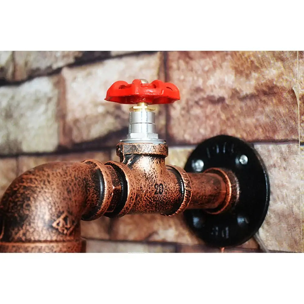 Industrial iron rust wall light featuring a copper pipe faucet with a bright red handle and black flange decorbites industrial iron