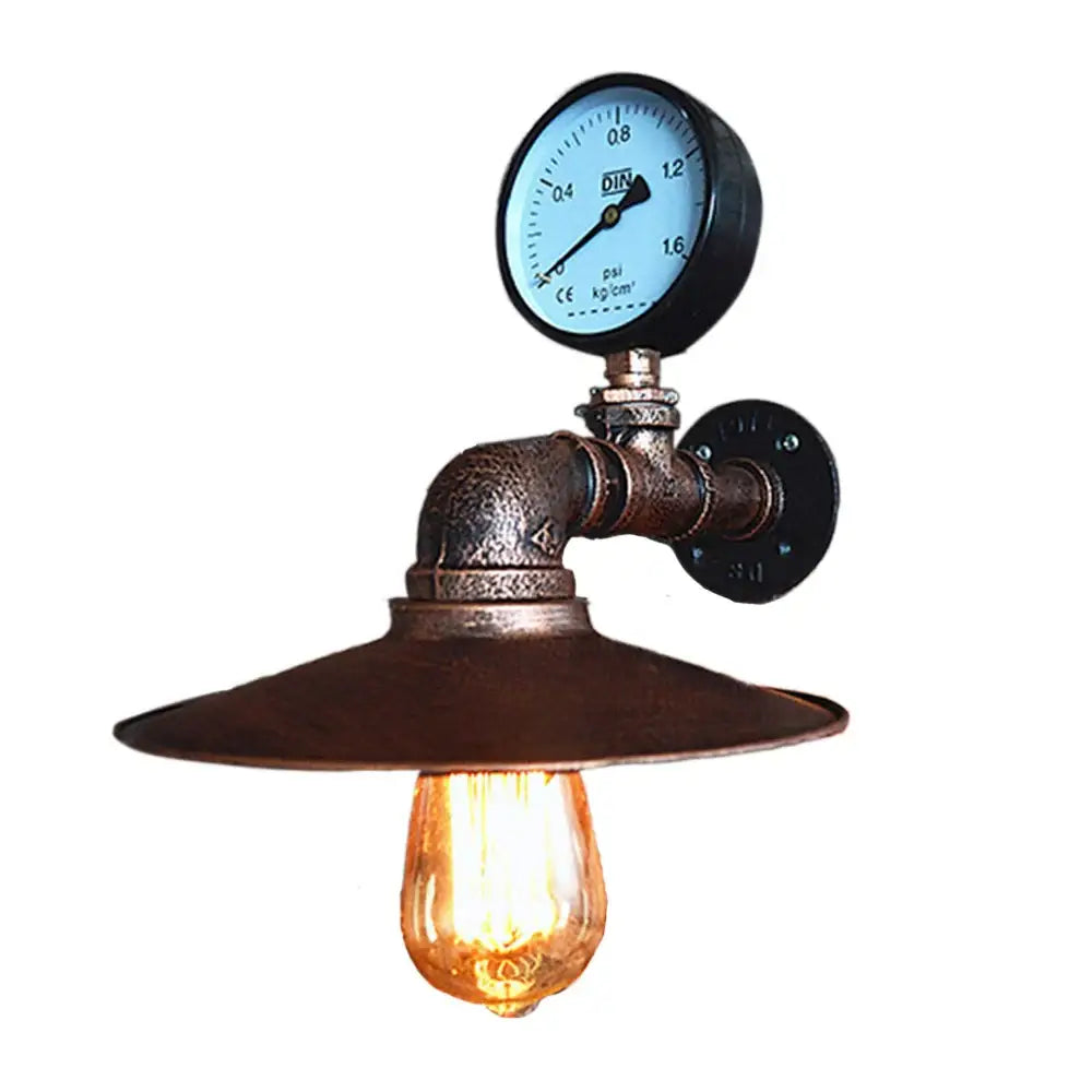 Industrial iron rust wall light featuring a brass-finished pipe and gauge with an amber glass bulb for decorbites industrial iron decor