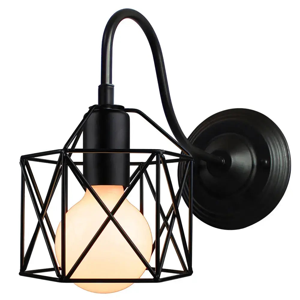 Black metal wall sconce with geometric cage design and illuminated bulb decorbites industrial iron wall fixture