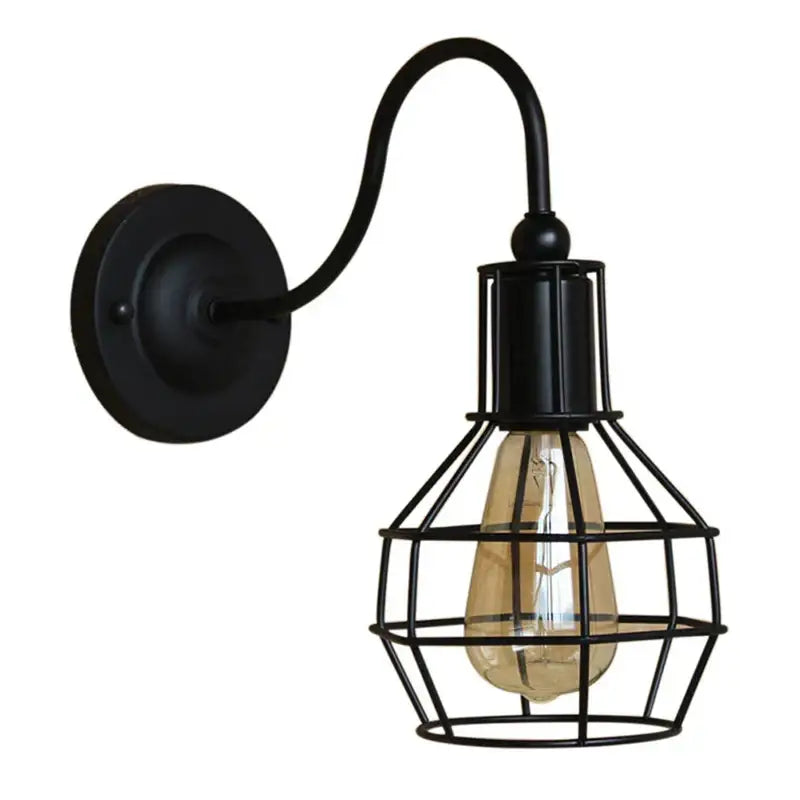 Black wrought iron wall sconce with cage light and amber filament bulb for decorbites industrial iron wall decor