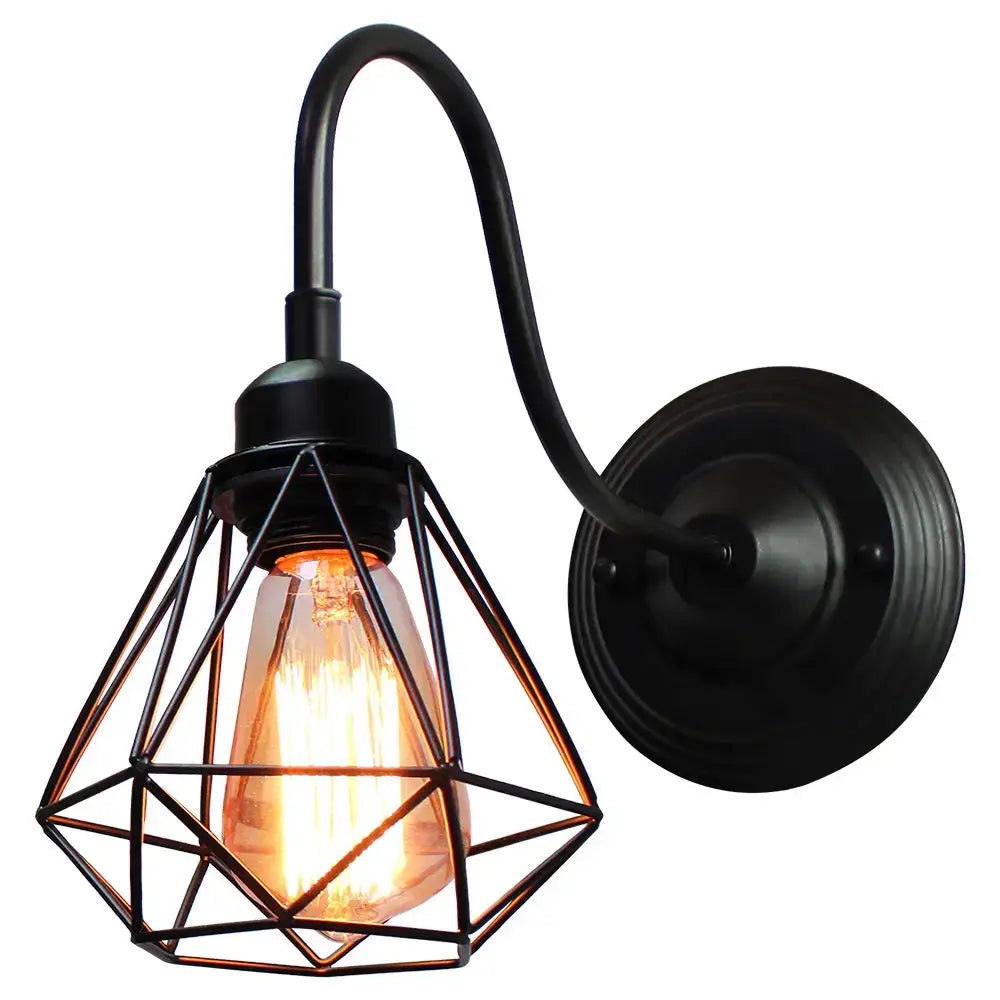 Black wrought iron wall sconce with geometric cage and exposed filament bulb for decorbites industrial iron wall decor