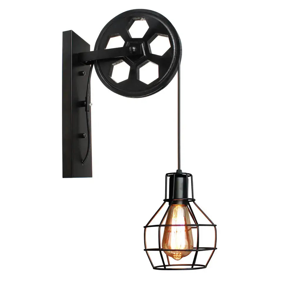 Black industrial iron wall sconce with wooden pulley and cage-encased bulb for decorbites industrial iron cafe decor