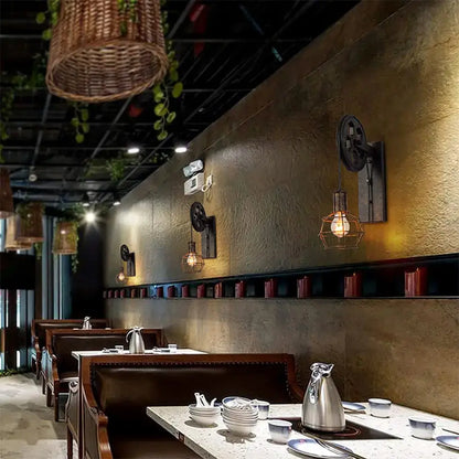 Industrial iron wall sconce with black metal gear fixture wooden pulley and hexagonal wire cage for cafe decorbites decor