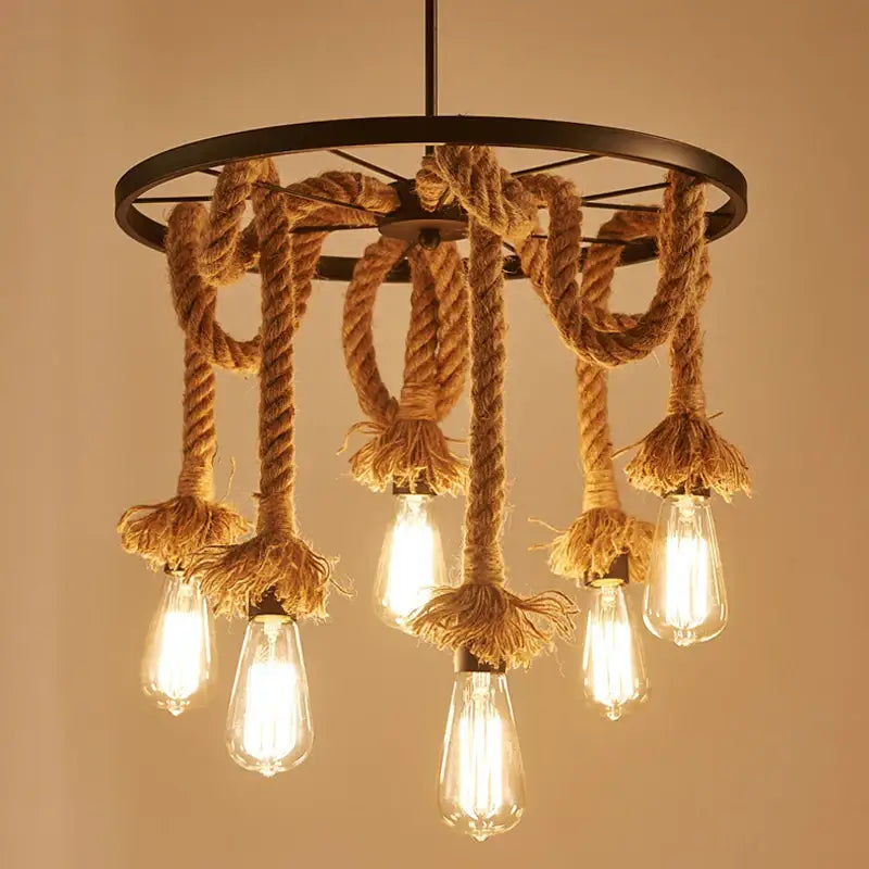 Rustic industrial loft chandelier with black metal ring and natural rope supporting exposed Edison bulbs for dining room decorbites industrial loft