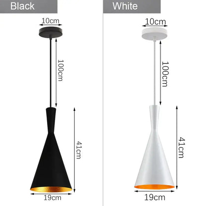 Black and white conical pendant lights with gold-lined interiors in a decorbites industrial loft chandelier pendant for dining room