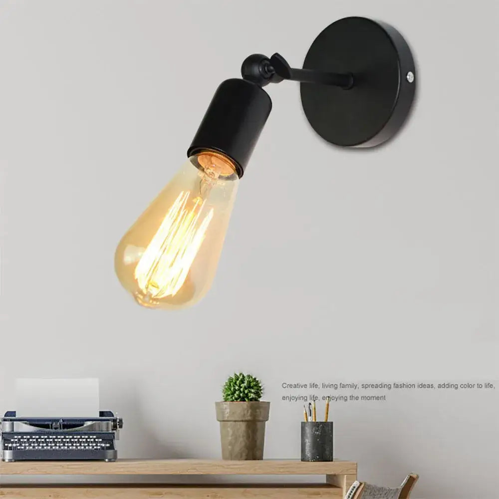 Black industrial loft led cage wall light sconce with vintage edison bulb brass and glass decorbites industrial loft design