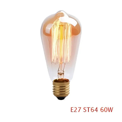 Vintage-style amber glass filament bulb with brass base in industrial loft led cage wall light sconce by decorbites industrial loft