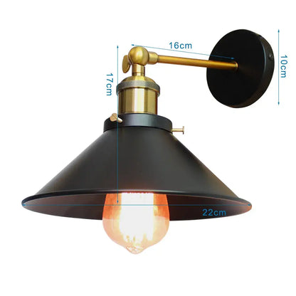 Industrial loft led cage wall light sconce with matte black conical shade brass arm and exposed edison bulb decorbites industrial loft