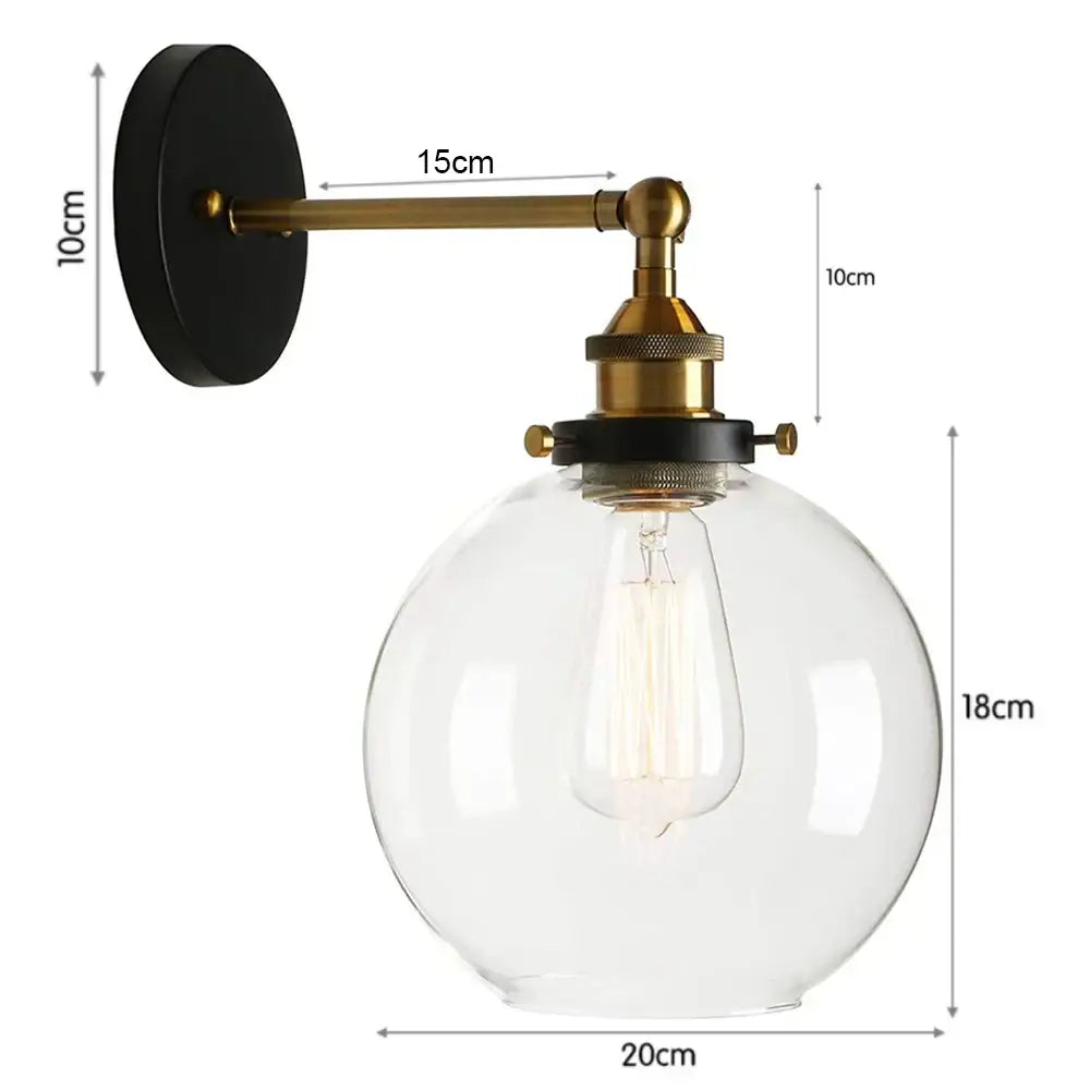 Vintage-style industrial loft led cage wall light sconce with brass metal arm and clear glass globe housing Edison bulb