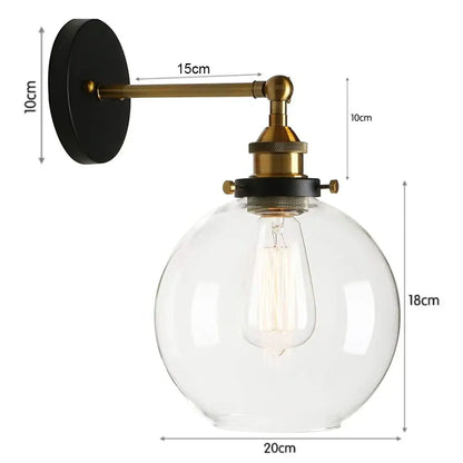 Vintage-style industrial loft led cage wall light sconce with brass metal arm and clear glass globe housing Edison bulb