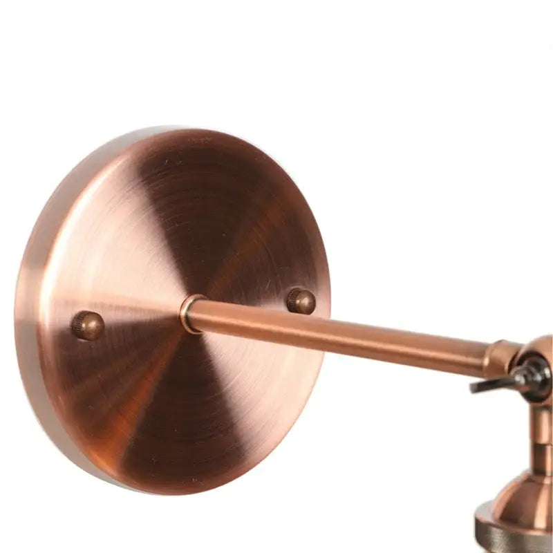 Antique brass-finished industrial loft led wall light with adjustable arm and glass shade for bedroom decorbites industrial loft