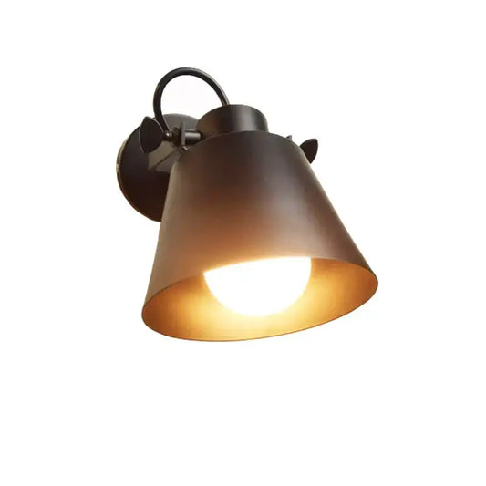 Industrial matte black adjustable edison wall light with matte metal shade and warm exposed bulb for bedroom decorbites sconce